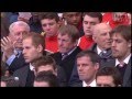 Kenny Dalglish gets a standing ovation. He looks distraught, tries a weak smile