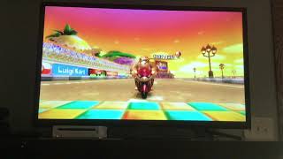 Beating all 4 expert staff ghosts in the Star Cup in Mario Kart Wii!