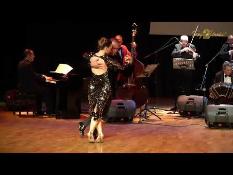  Utku Kuley  and  Iris Basak Dogdu  are  dancing  to  a  tango  by  Los reyes del tango  at  TanGO TO Istanbul  in  2019