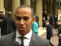 Hamilton Receives MBE From The Queen