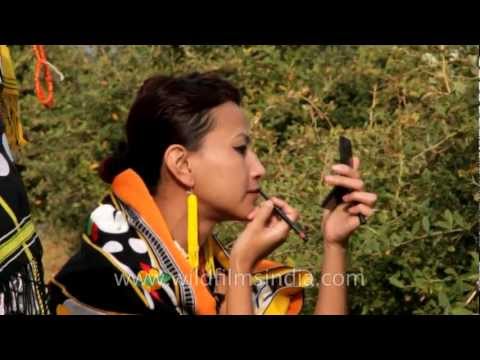 Mercy Tetseo trying on her lipstick shade!