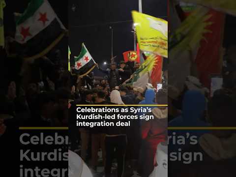 Celebrations as Syria's Kurdish-led forces sign integration deal