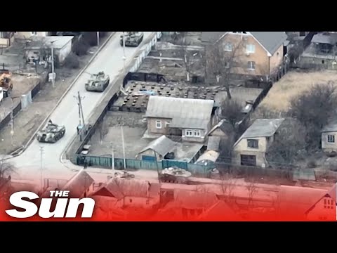 Russian 'Z tank fires at a civilian cyclist' in Bucha, Ukraine