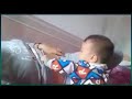 Young Mother Breastfeeding A Crying Baby