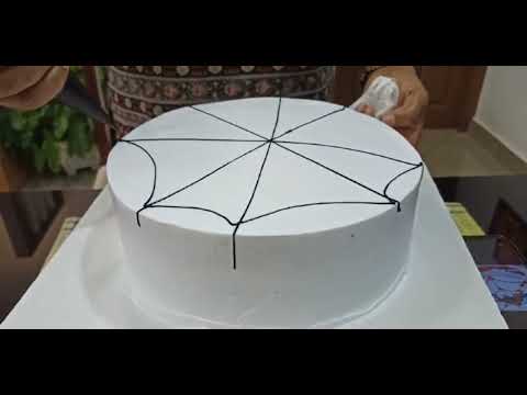 Easy tutorial on how to make a spider web design on a cake! 🎂 by hazeenbakearts.