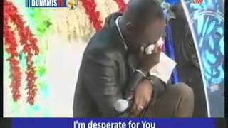Dr Pst Paul Enenche weeps in Worship (with his daughter)