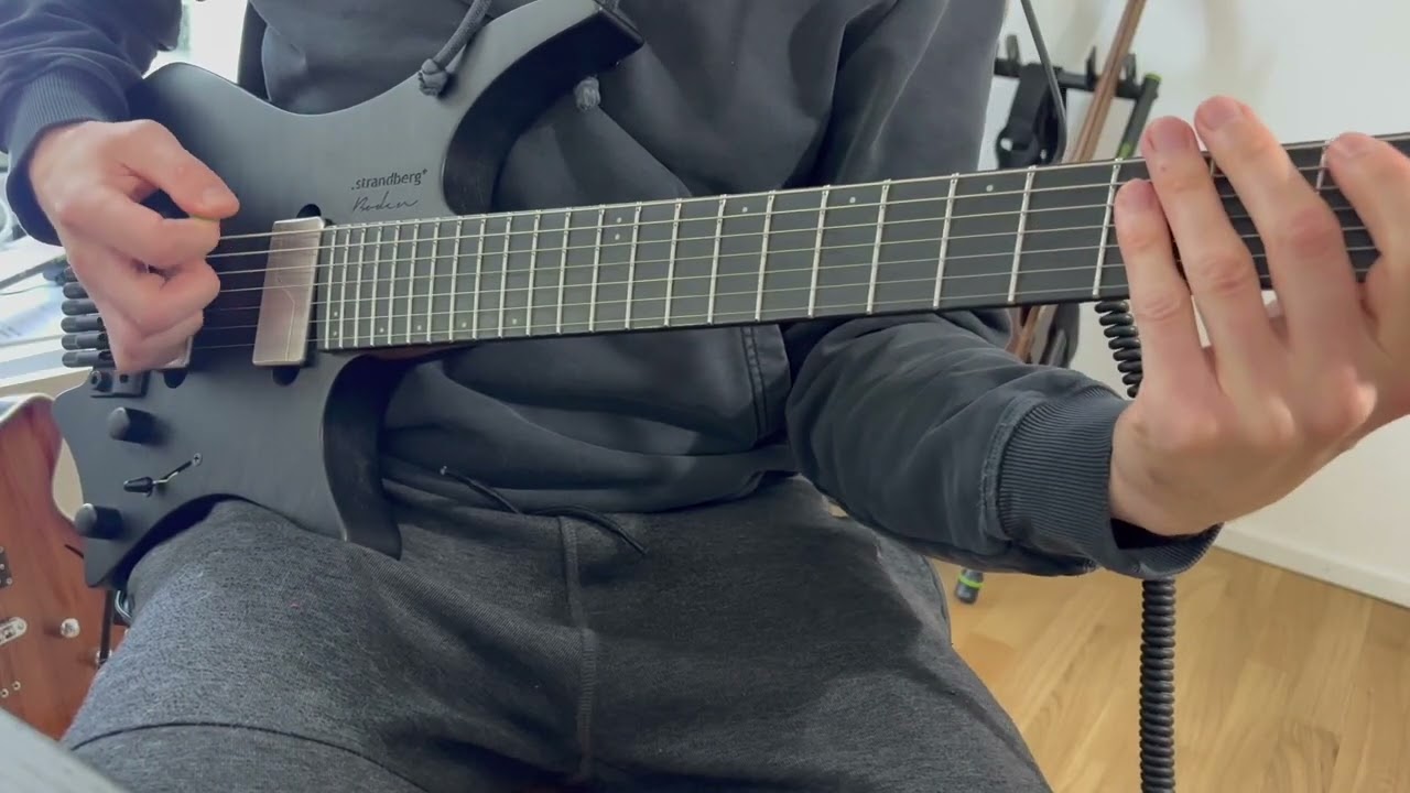 Roberto Barlocci playing a heavy metal guitar cover of Mamushi with distortion