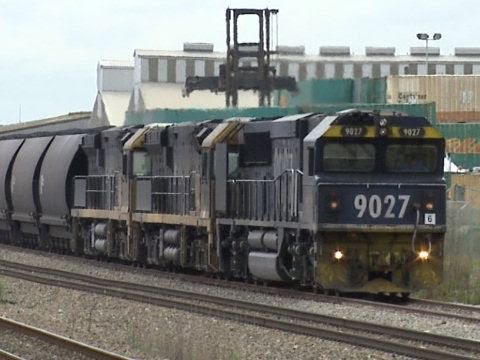 Two coal trains cross at Sandgate NSW - Pacific National trains in Australia
