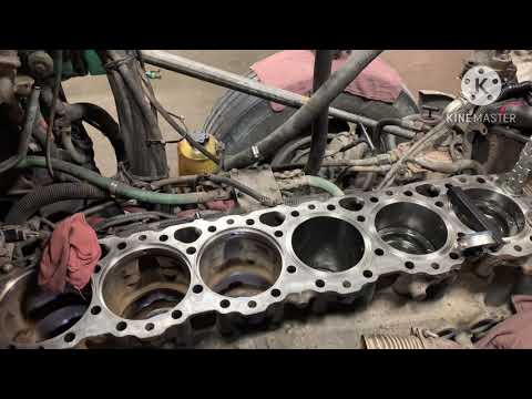 14L Detroit diesel liners assembled, installed, and protrusion measured