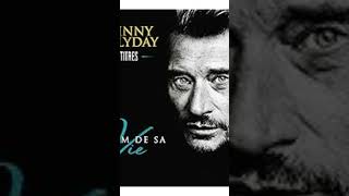 Les bras en croix. Johnny Hallyday.