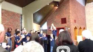 Roman singing Our God is an Awesome God