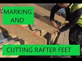 Cutting roof truss rafter feet. (rafter tails)