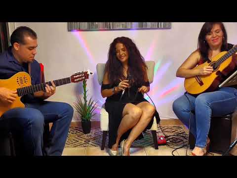 Allá en la altura - voz Celenia , cuatro Maribel Delgado , guitarra Camilo Gaud