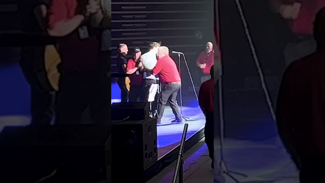 Drunk fan rushes the stage at Bryan Adams concert in Salt Lake City during ‘Summer of 69’