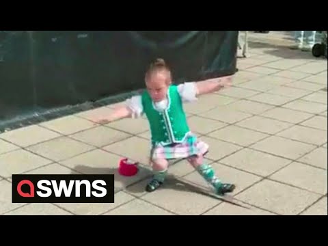 Determined highland dancer who falls over gets straight back up and carries on | SWNS