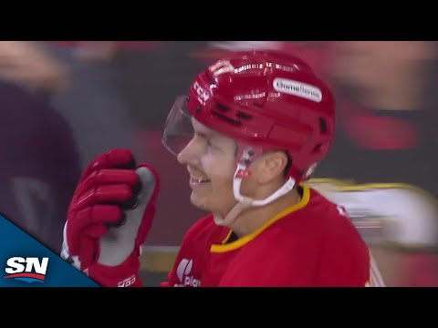 Flames' Yegor Sharangovich Squeaks One Through Igor Shesterkin