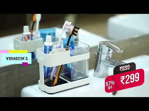 White plastic toothbreush holder, for bathroom