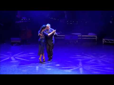  Daniel Nacucchio  and  Cristina Sosa  are  dancing  to  a  tango
