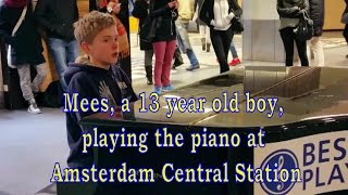 preview picture of video 'Mees, a 13 year old boy, plays piano at Amsterdam Central Station'