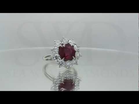 Ruby Ring With Round Diamonds On The Halo
