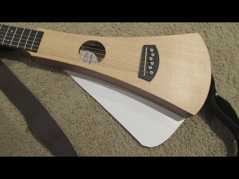 I made a "Wing" for my Martin Backpacker Guitar, lowered the  action, and added an electric pickup.
