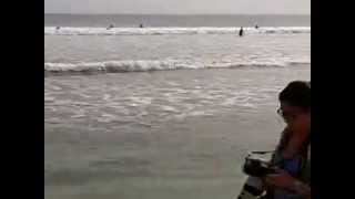 preview picture of video 'Tourists surfing at Kuta beach-Bali'