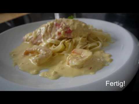 Lachsfilet mit Safransoße und Shrimps