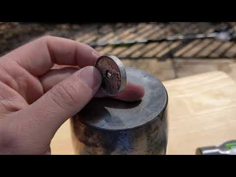 Hammered trench art coin ring