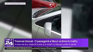 Exasperată de circulația din București, o femeie s-a dat jos din tramvai și a făcut ordine în trafic