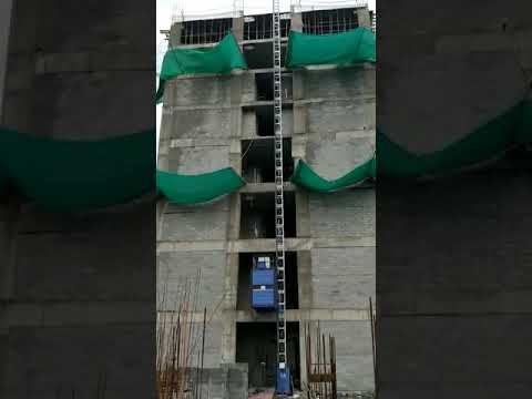 Electric heavy passenger cum material hoist, for industrial,...