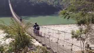 preview picture of video 'Smoking Joe's Motorcycle Tours & Rentals. Foot Bridge crossing in Nepal'