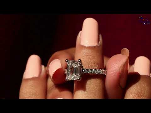 Admirable 14 Kt White Gold Emerald Cut Diamond Solitaire Ring For Women with Fancy Design