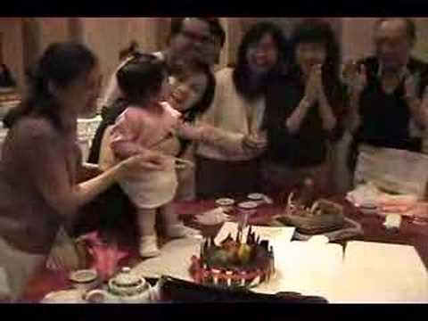 Charise Lee 1 year old cutting cake at 888