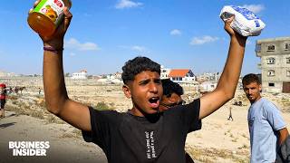 Chaos Erupts After Thousands Of Palestinians Rush To Grab Aid In Gaza | Insider News