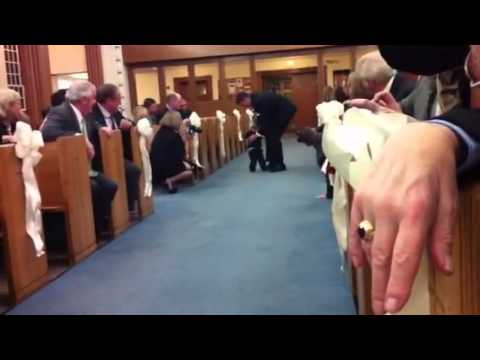 Michael walking down the aisle at the Black wedding