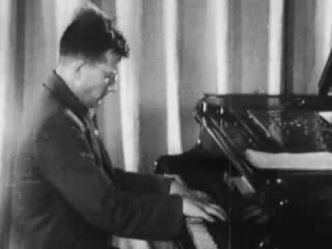 Shostakovich plays a fragment of his 7th symphony (1941)