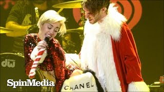 Miley Cyrus Debuts A New Haircut and Gets All Freaky with Santa Claus at Jingle Ball