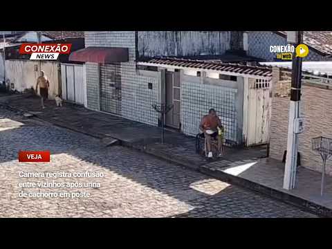Vídeo: Câmera registra confusão entre vizinhos após urina de cachorro em poste.