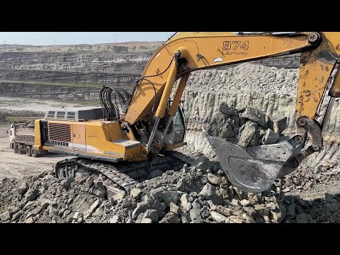 Liebherr 974 Excavator Loading Mercedes And MAN Trucks