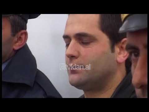 Dem Dollapi paraqitet ne seancen gjyqesore te 14 Shtatorit (21 Shkurt 2002)