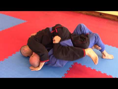 Video 8 - Side Control Escape Bridge and Roll Series