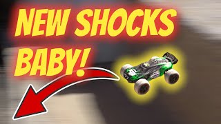 WLTOYS 144001 shocks onto the EACHINE EAT11 that transforms the car!