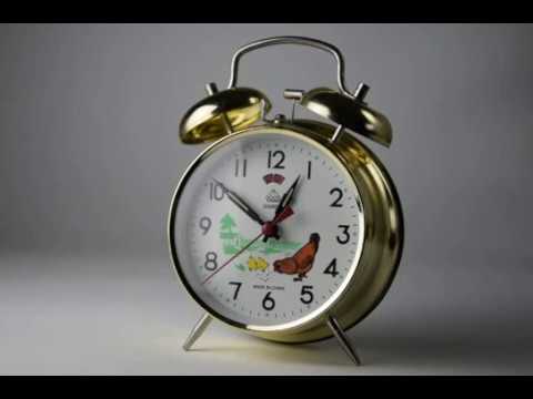 Złoty budzik z dziobiącą KURĄ