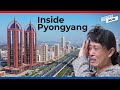 Tour of North Korea’s “new town” in Pyongyang with buildings shaped like missiles!