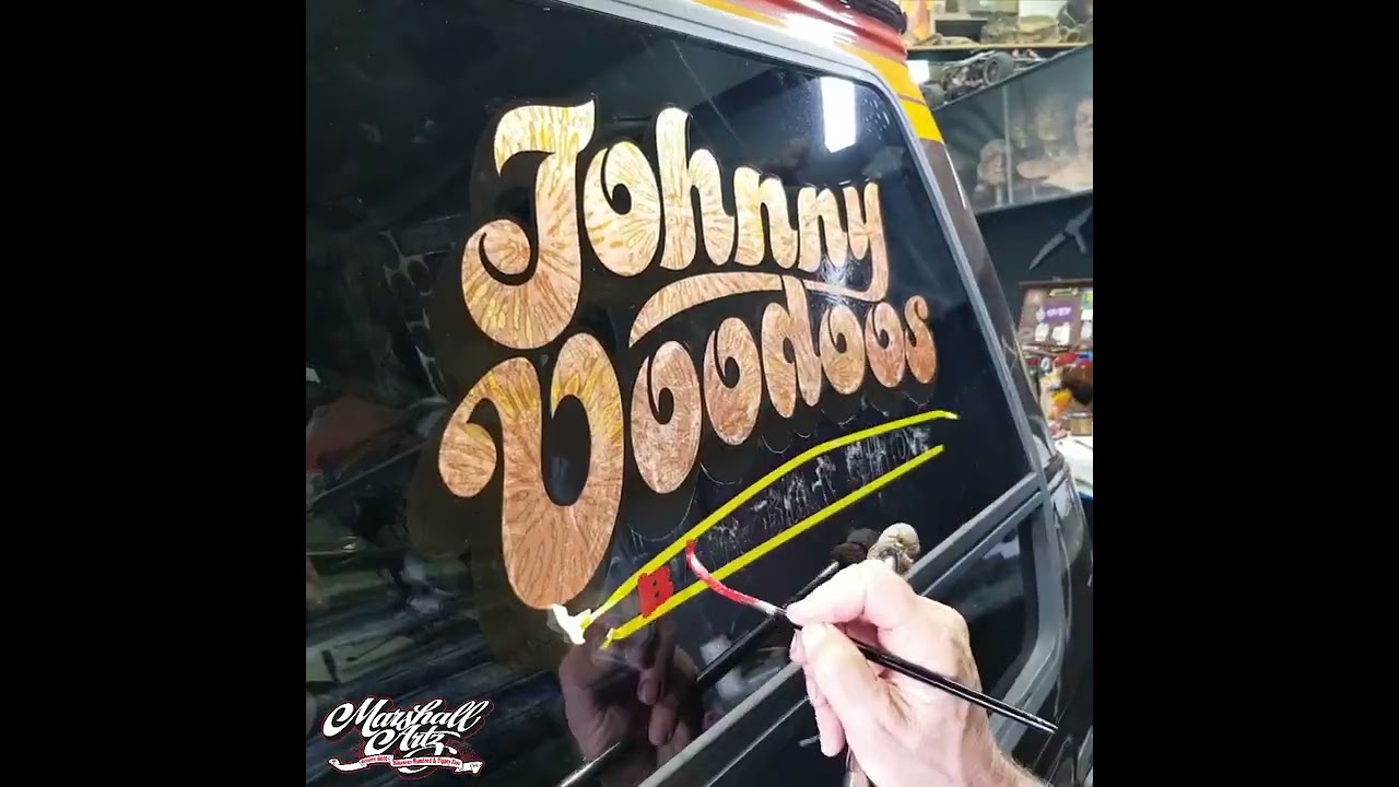 signwriting a 1978 G10 van.