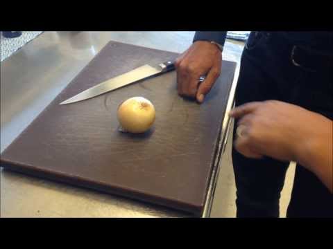 The Breeze: Josh Emett shows Robert Rakete and Robert Scott perfect onion cutting