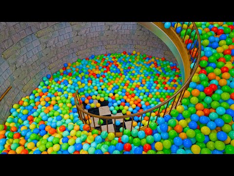 Color balls on spiral stairs | Stairs filled with ball pit balls
