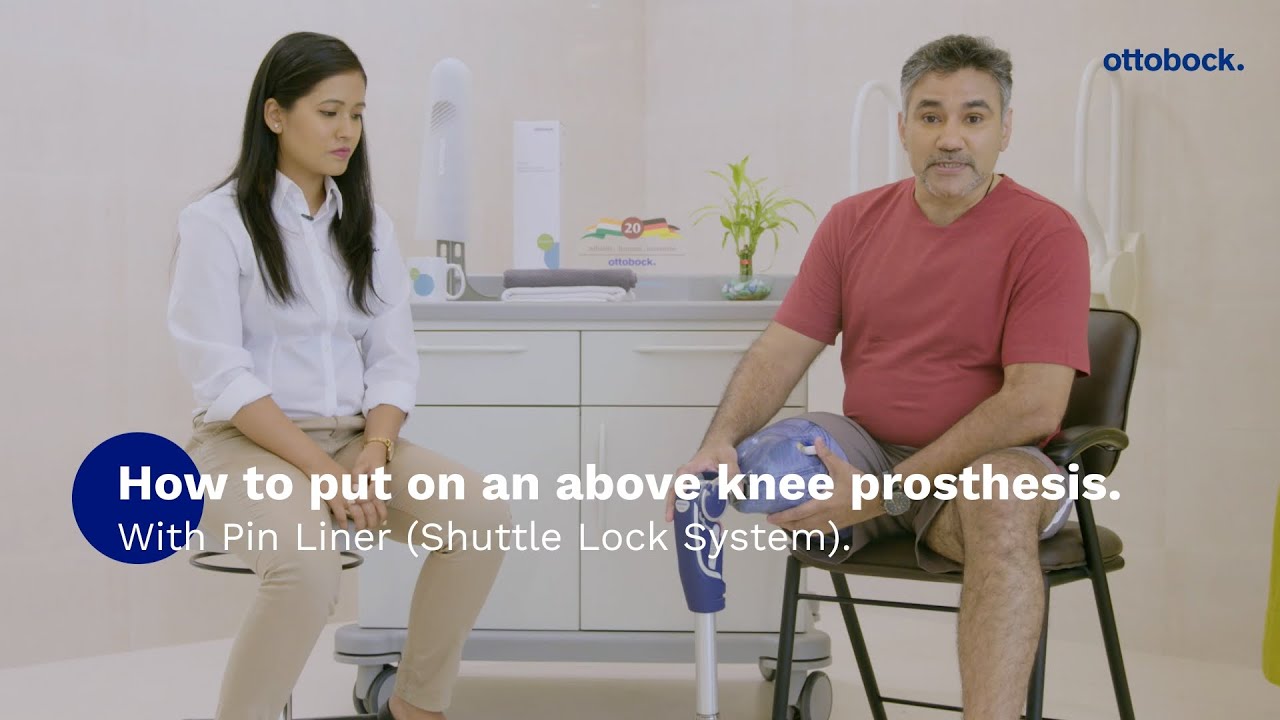 How to put on an above knee prosthesis with Pin Liner (Shuttle Lock System)? | Ottobock