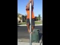 Asa Climbs Street Pole