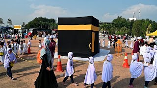 Malaysian children in practice run for Muslim hajj